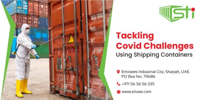 Shipping_containers A man spraying disinfectant chemicals on the cargo container in protective suits to prevent the spread of the Coronavirus